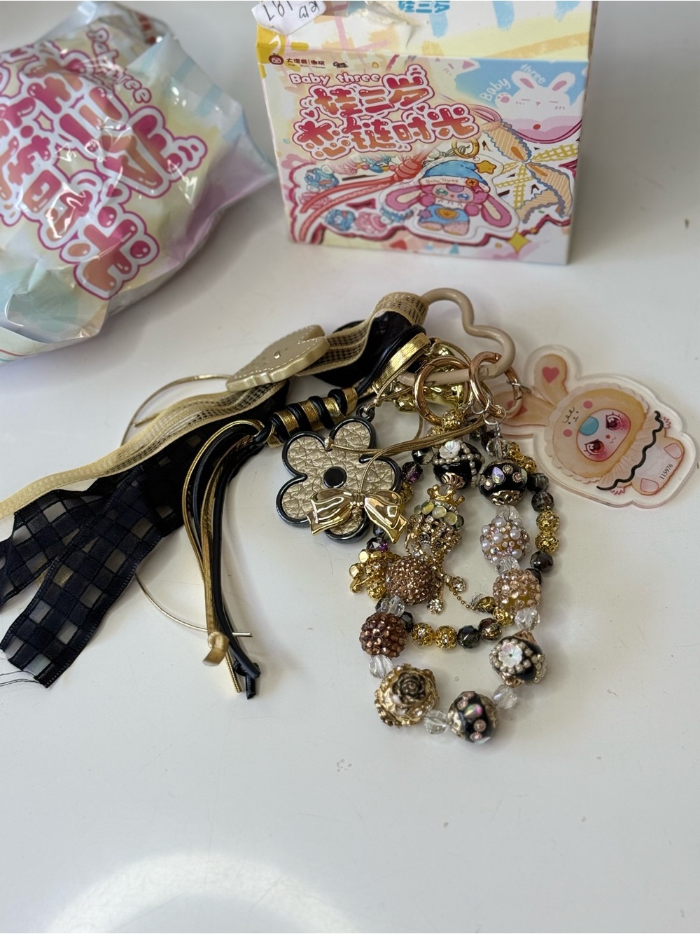 Baby Three Beaded Charm Keychain with Gold and Black Accents SECRET! Confirmed .